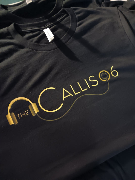 Black t-shirt with gold 'Callis 06' logo on a flat surface